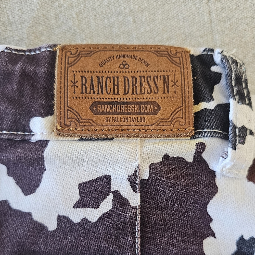 Ranch Dress'n cow print flares